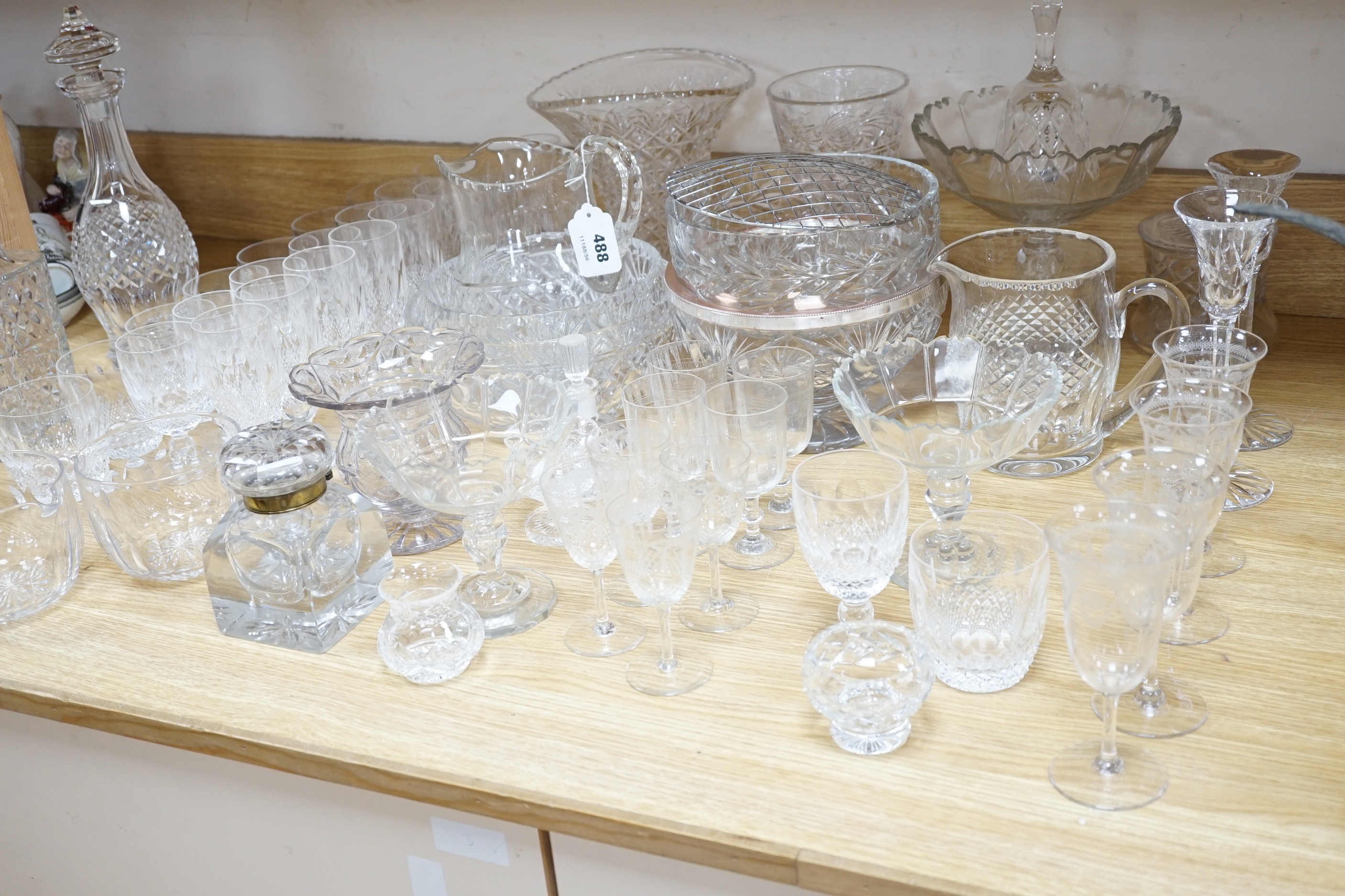 A Waterford cut crystal ‘’Colleen’’ pattern part suite of drinking glassware, together with a matching water jug and decanter and other glassware